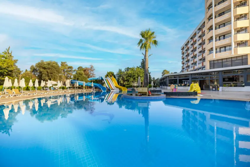 Budget hostel dorm room with backpacks and bunk beds in Europe