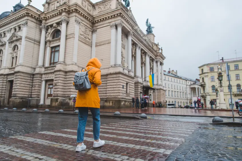 Free walking tour group exploring a historic European city square