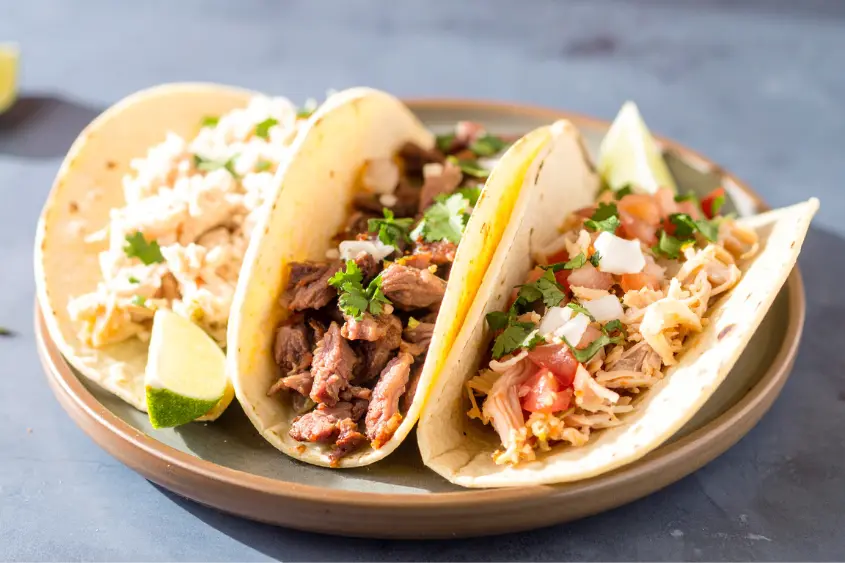 Traditional tacos de canasta on a bicycle basket in CDMX street market